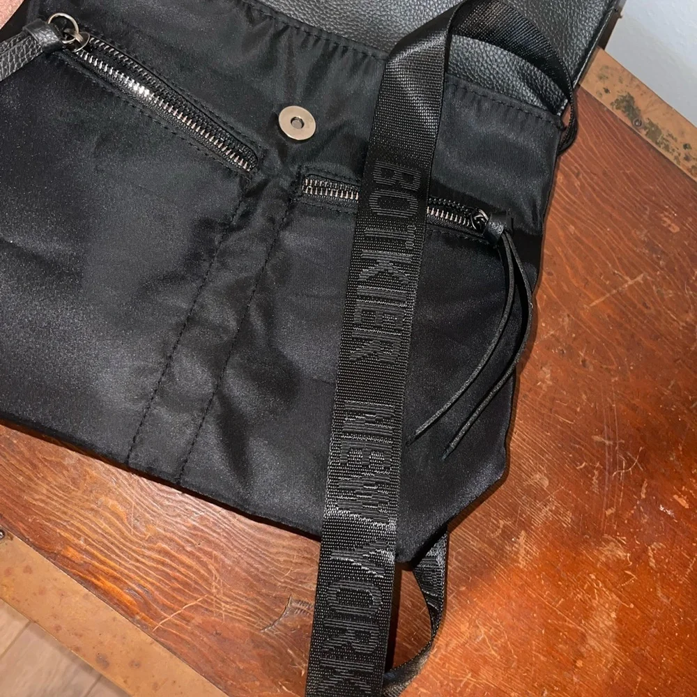 Small black backpack for woman (TP for size comparison)